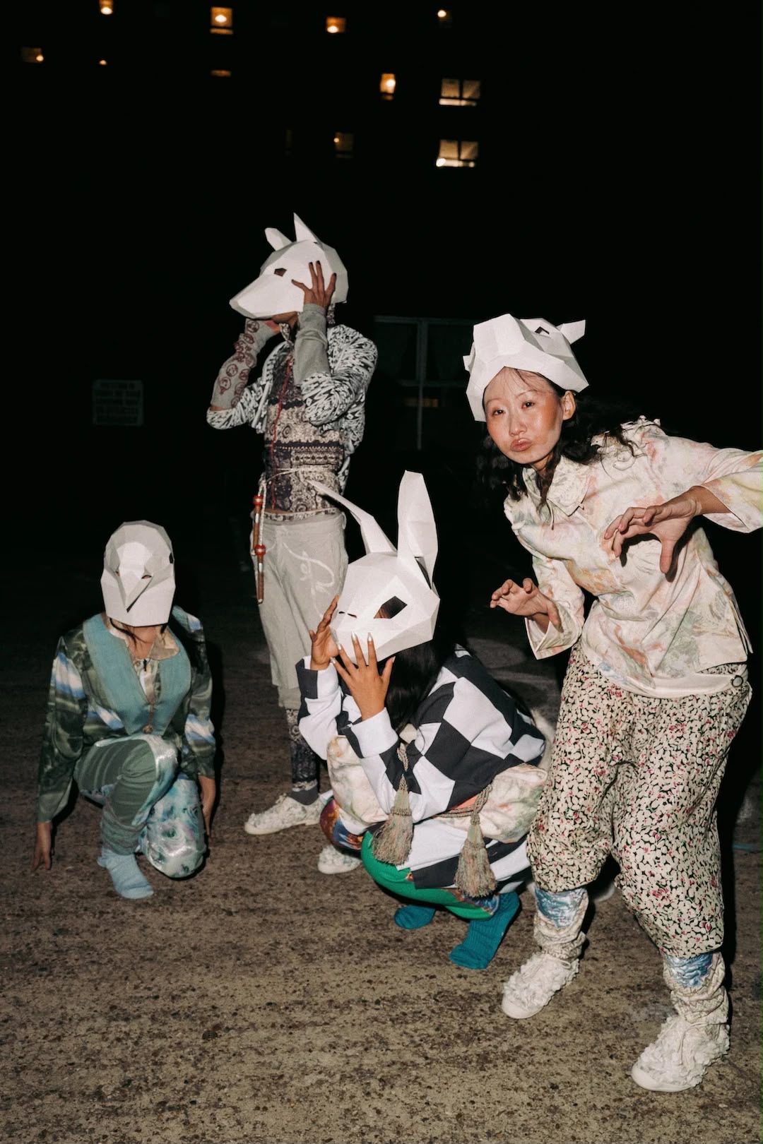 Models in masks on the GLISTER runway